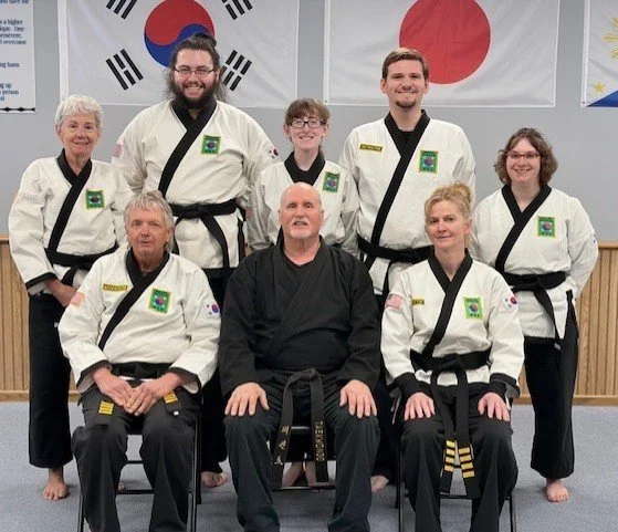 Sahboonim with active black belts at a testing. Sitting students are highest rank.