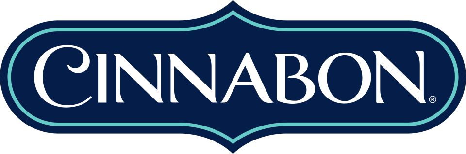 Cinnabon logo with white text on a dark blue background and a decorative border.