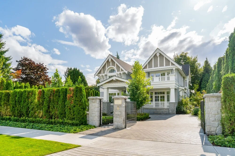 Front+gate+of+custome+home+built+by+Batista+properties.jpg