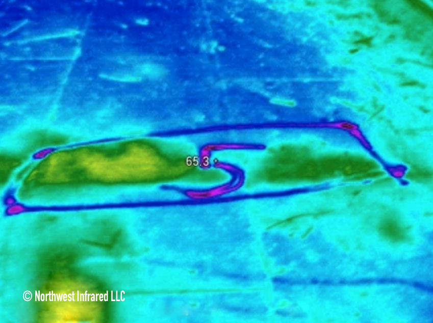 Infrared thermal image of a bracelet with three stones, one of which shows a temperature reading of 65.3 degrees.