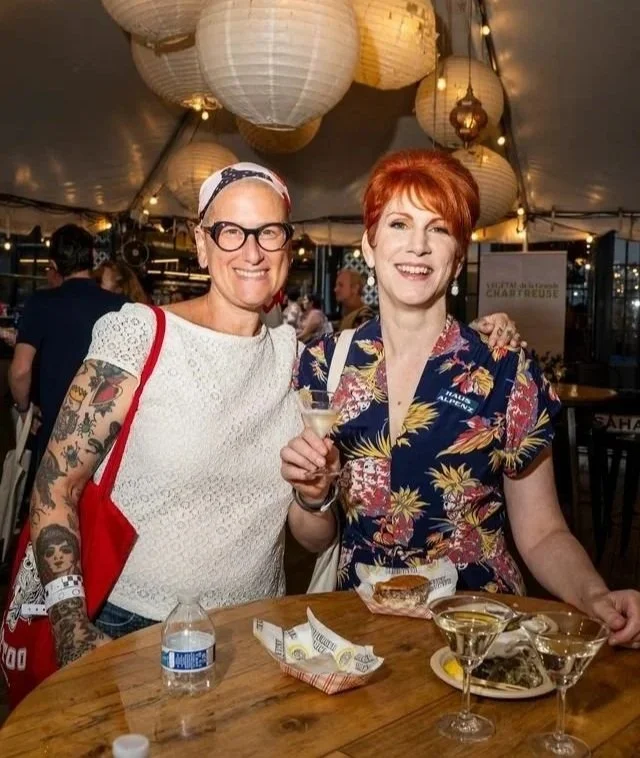 Two women smiling at Martini Masters New York after party.