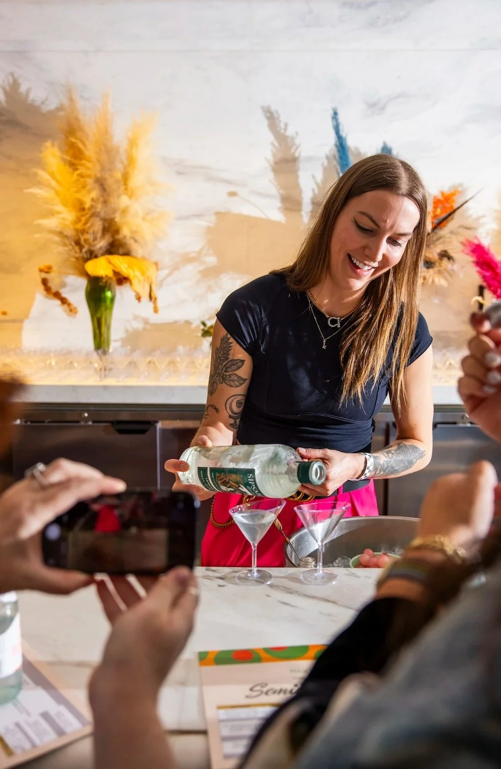 Katie Renshaw making a martini at Martini Expo.