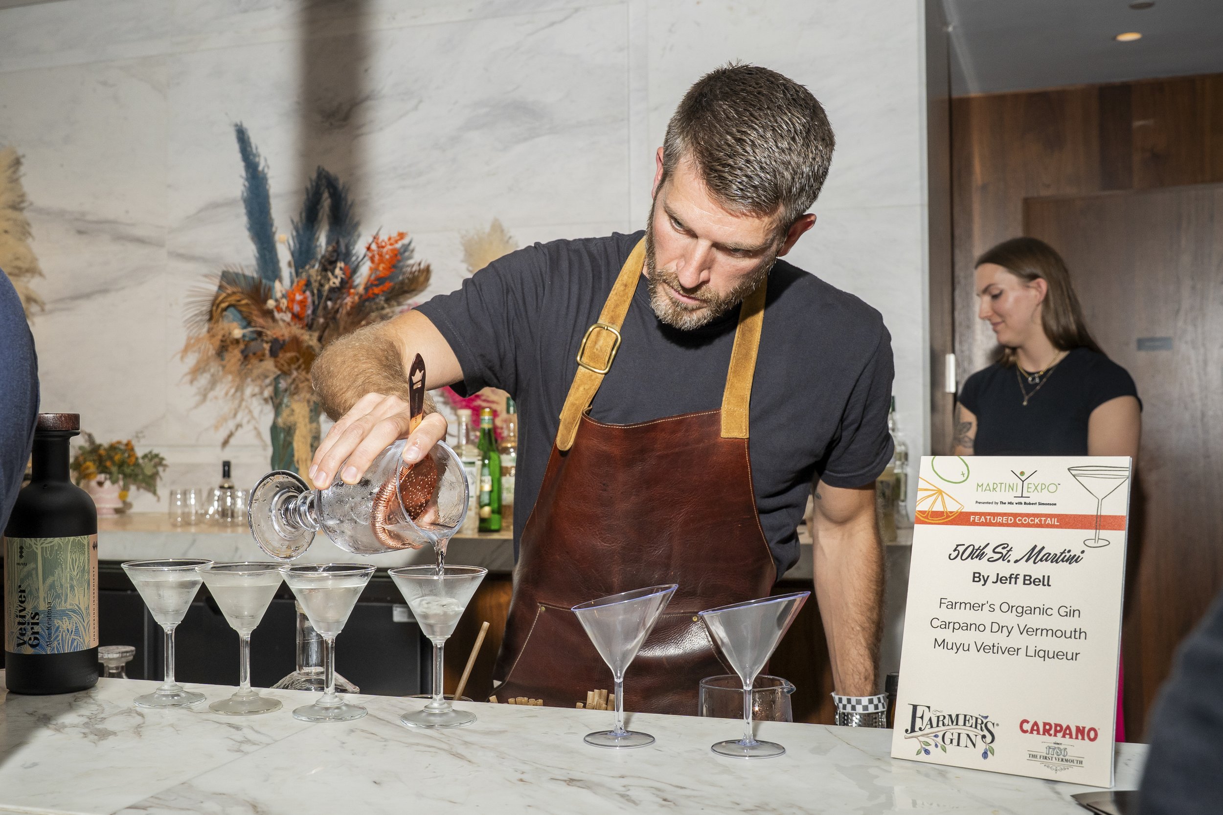 Man pouring Farmer's Gin Martinis