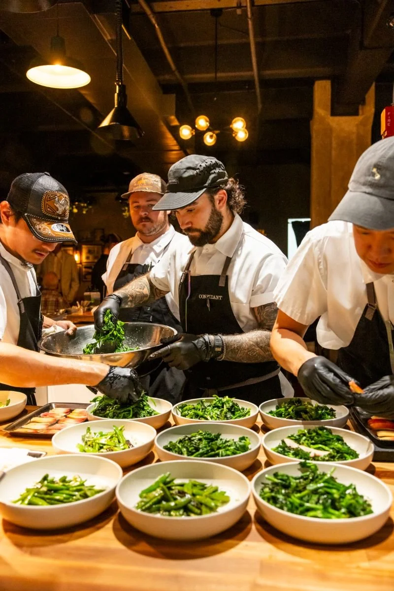 Chefs plating food for Martini Expo dinner series.
