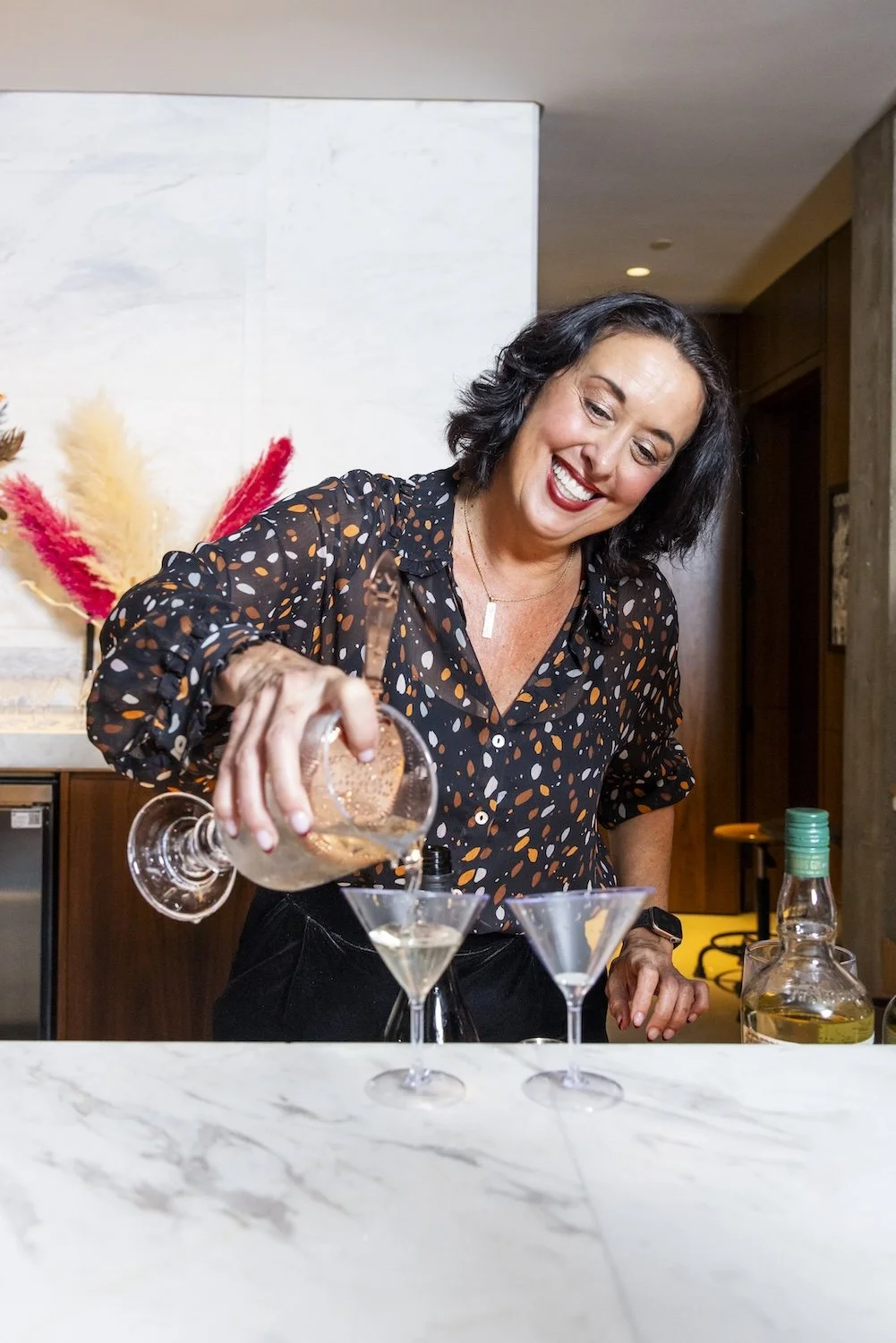 Julie Reiner making a martini at Martini Expo.