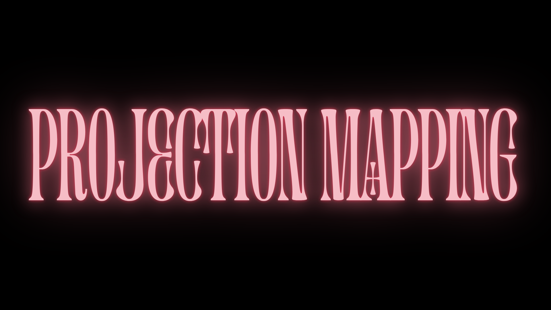 Pink neon sign that reads 'PROJECTION MAPPING' on a black background.