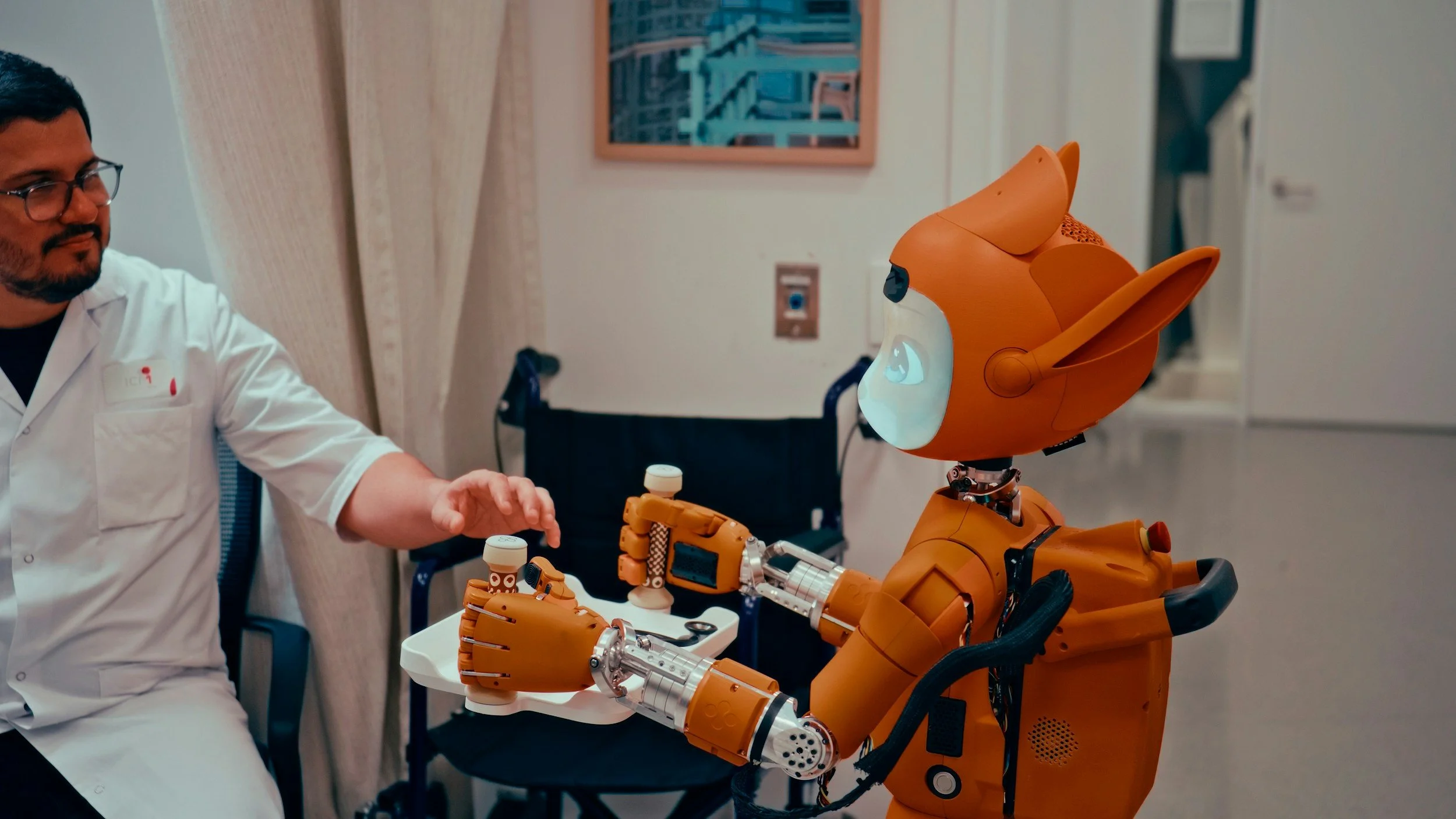 A human patient with a robotic arm being examined by a robot in a clinical setting.