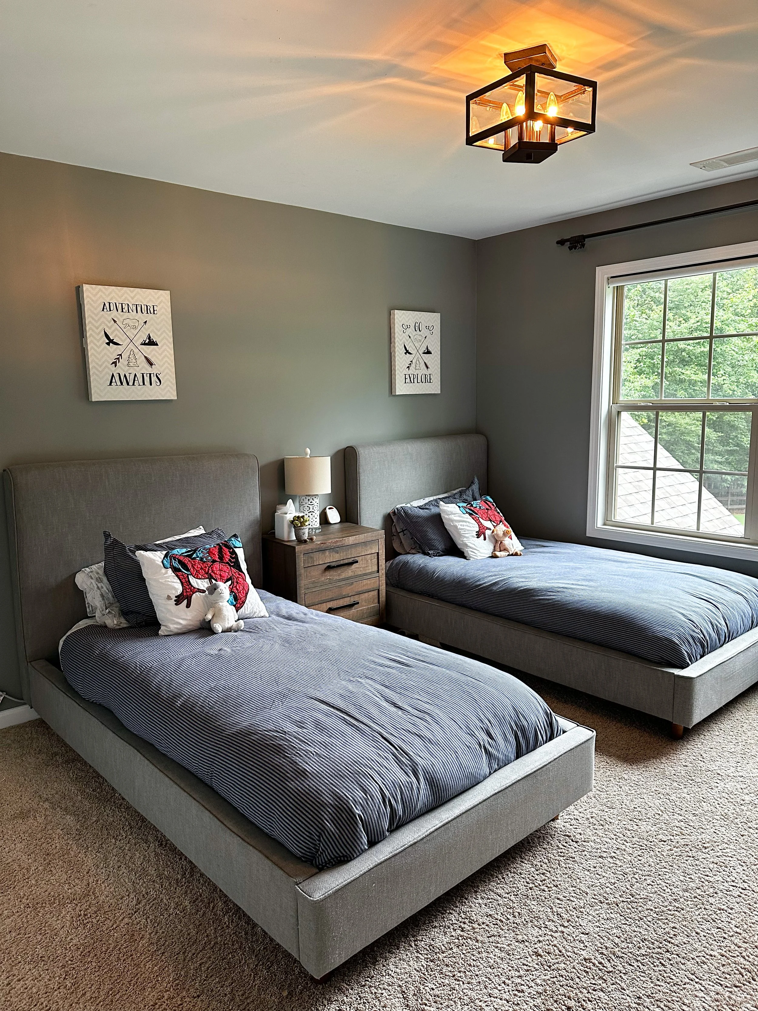 Boys twin bed room with grey walls and blue-grey bedding--Casa Limones interior design