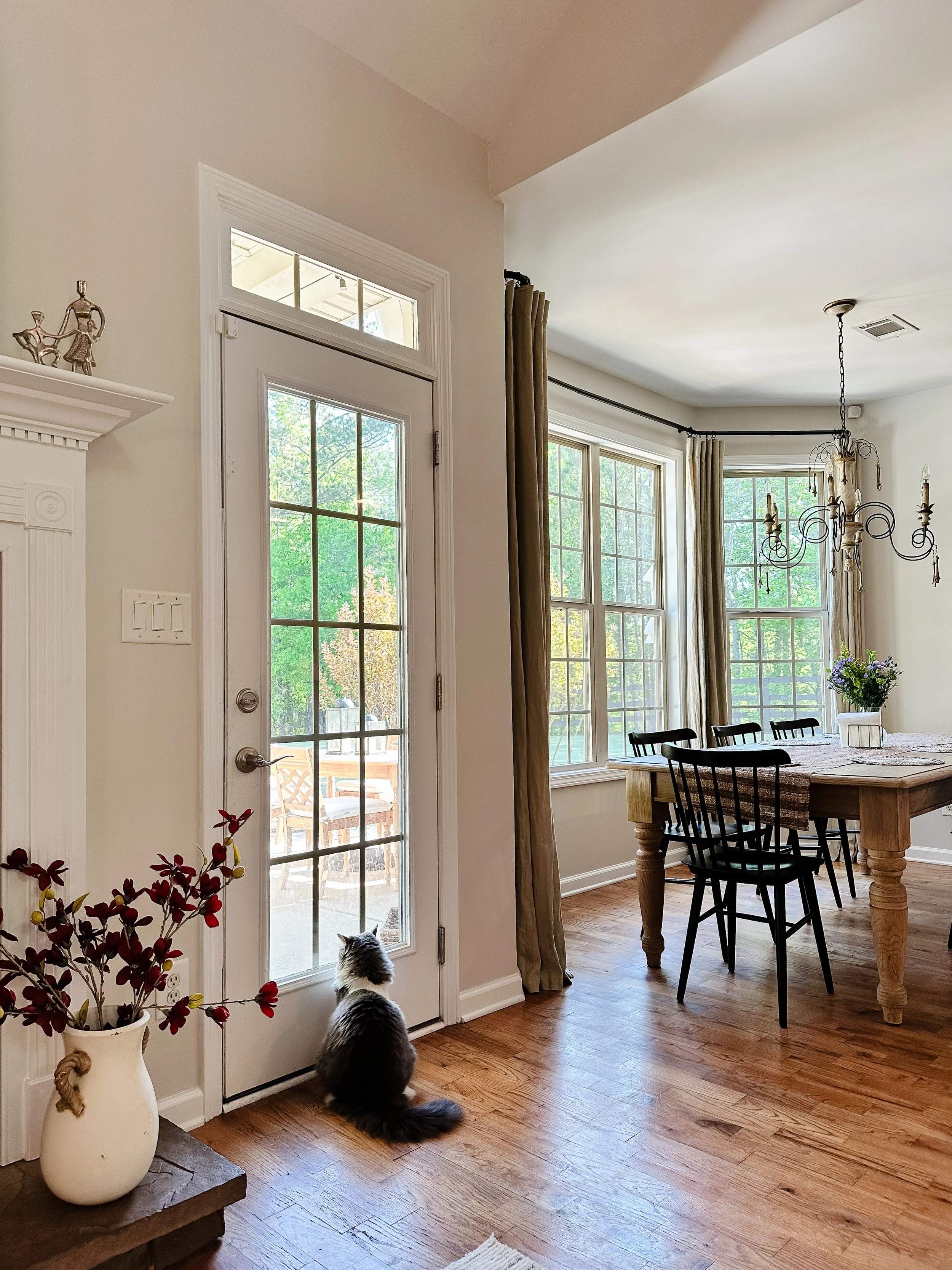 Breakfast nook with bay window and rustic country dining table--Casa Limones interior design