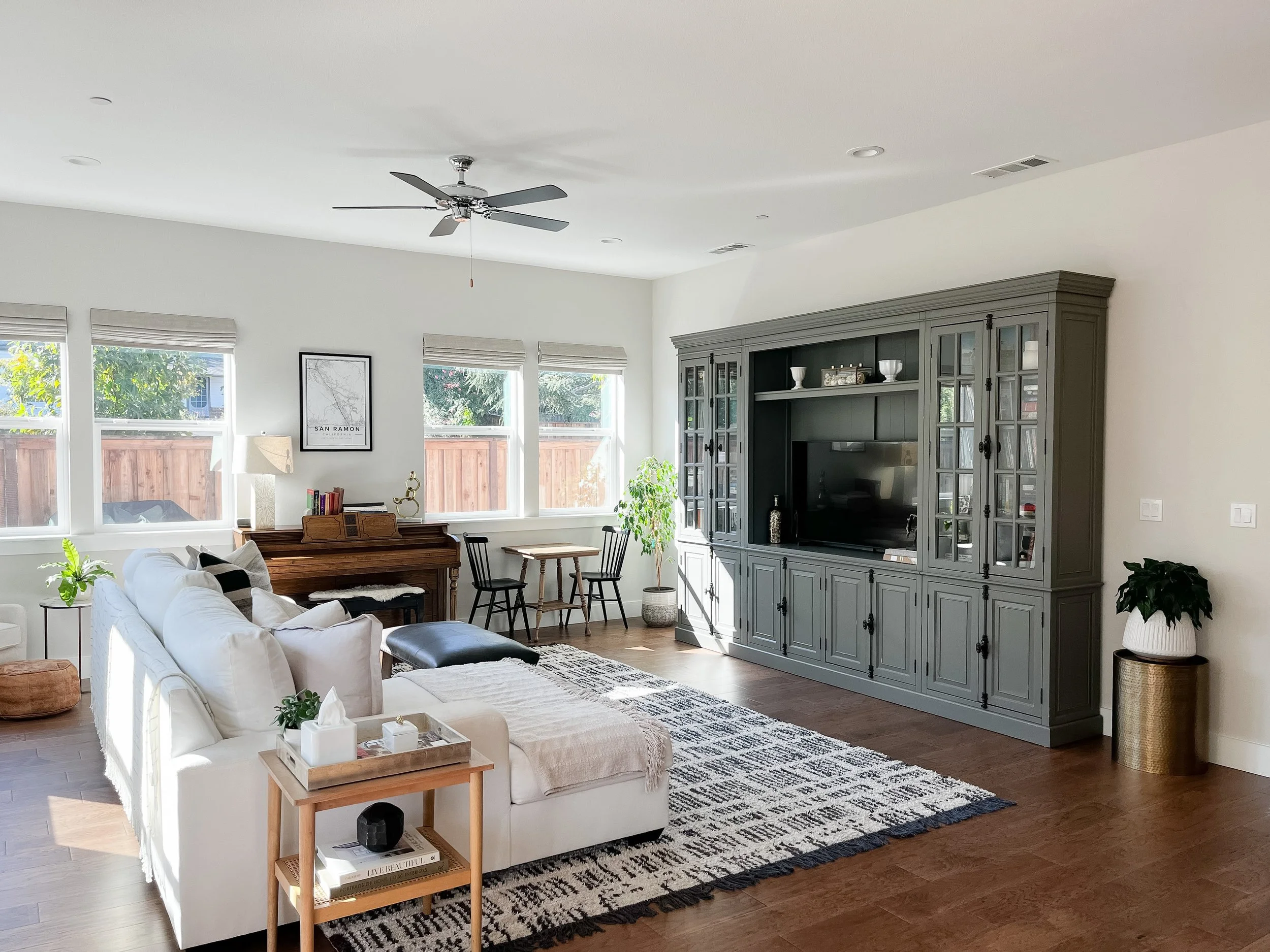 Neutral and grey living room family room with piano Casa Limones interior design Atlanta