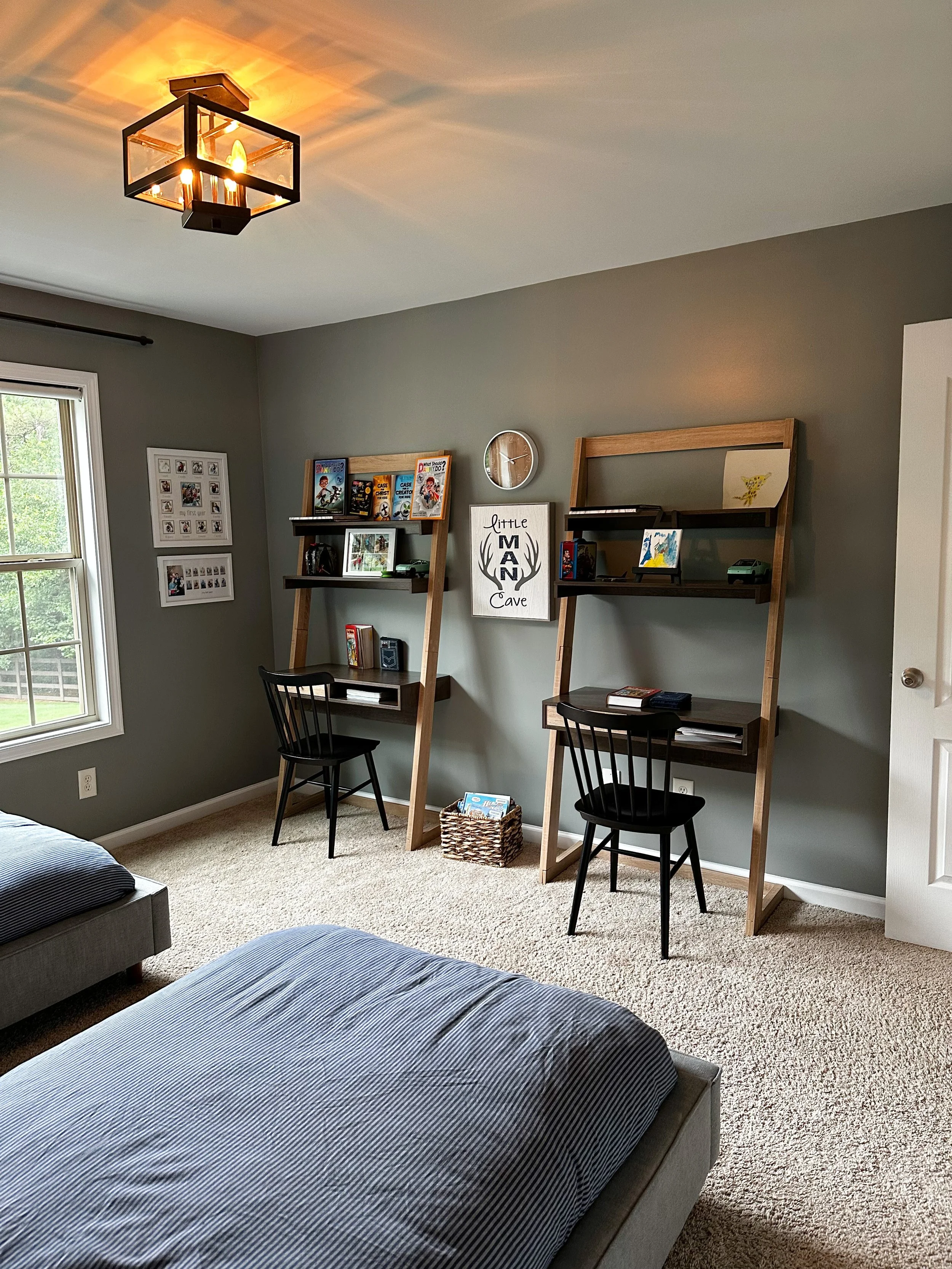 Boys twin room with wood desks and black chairs --Casa Limones interior design