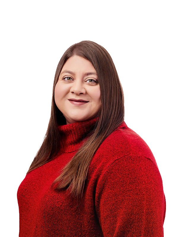 A woman with long brown hair wearing a red sweater, smiling at the camera, against a white background.