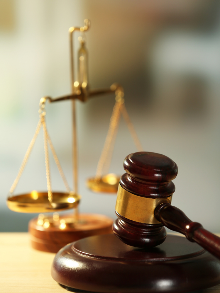 Gavel and scales representing justice reform and prison legislation advocacy in Tennessee