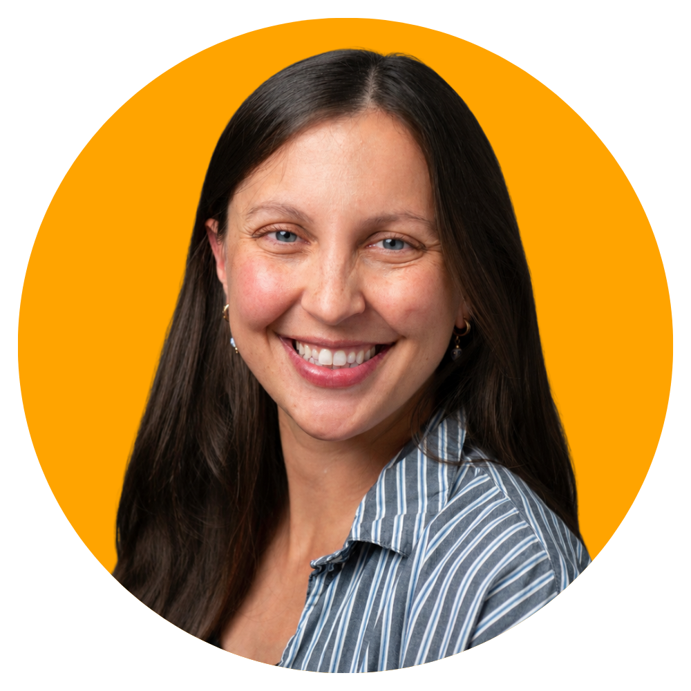 A woman with long dark hair, smiling, wearing a blue striped shirt, with an orange background.