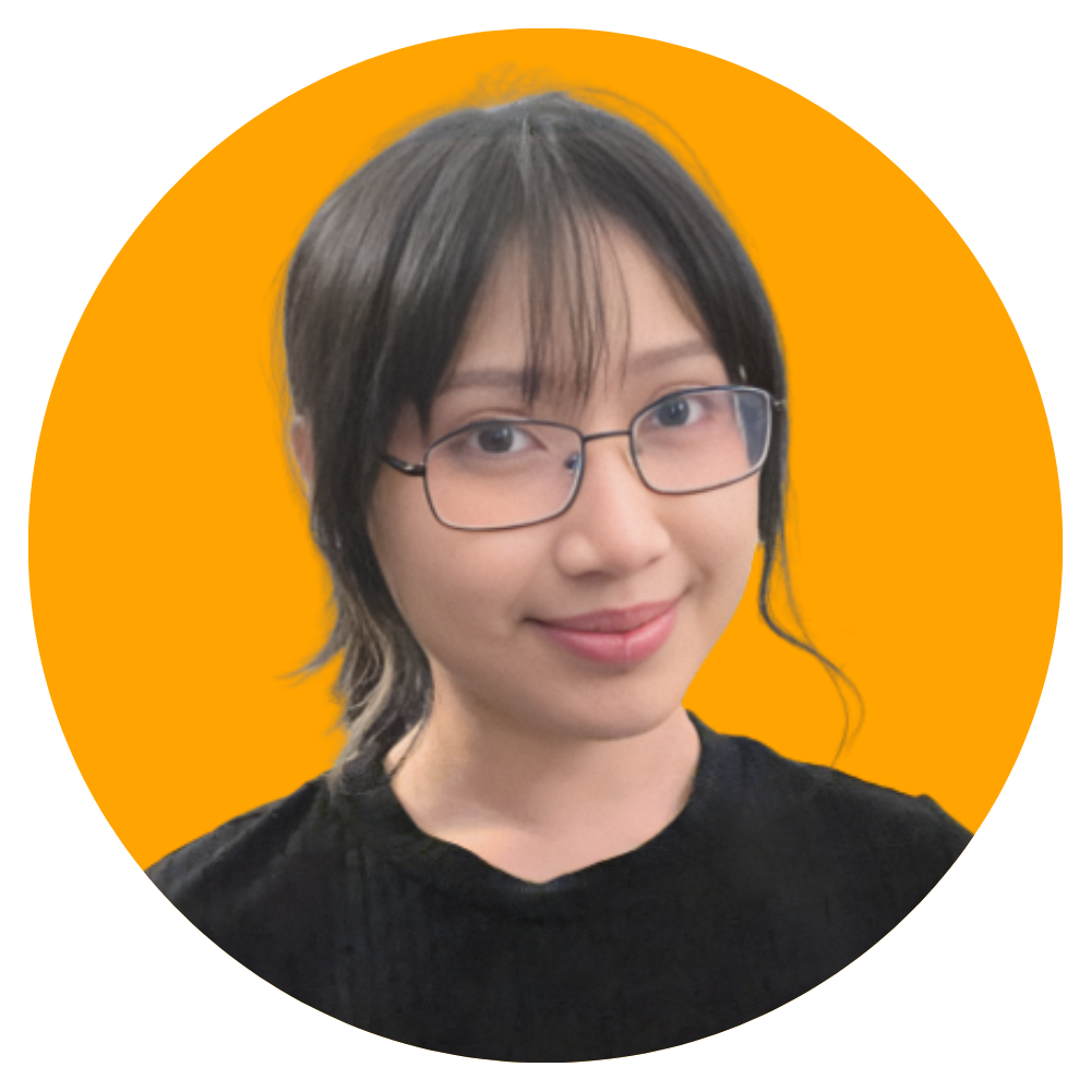 A woman with short dark hair, glasses, and a black top, smiling at the camera, with an orange background.