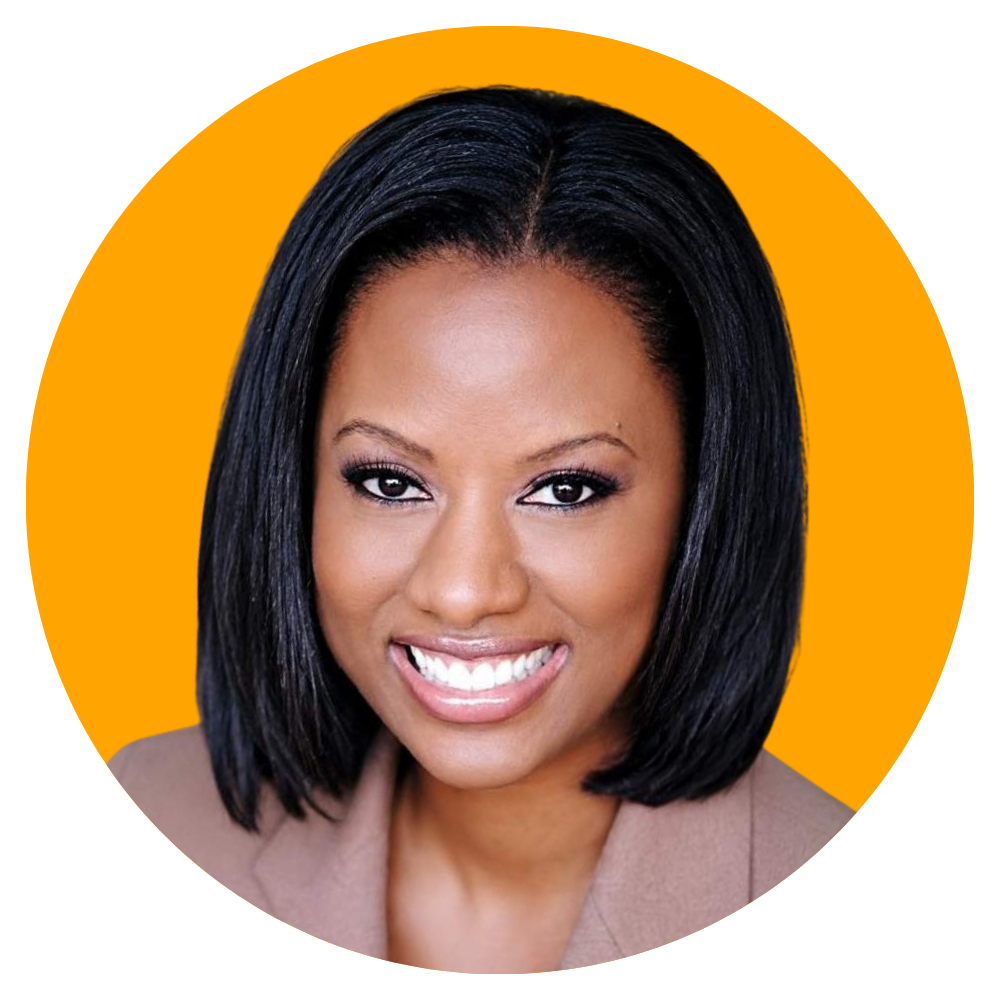 A woman with medium-length black hair, wearing makeup, and smiling in front of an orange background.