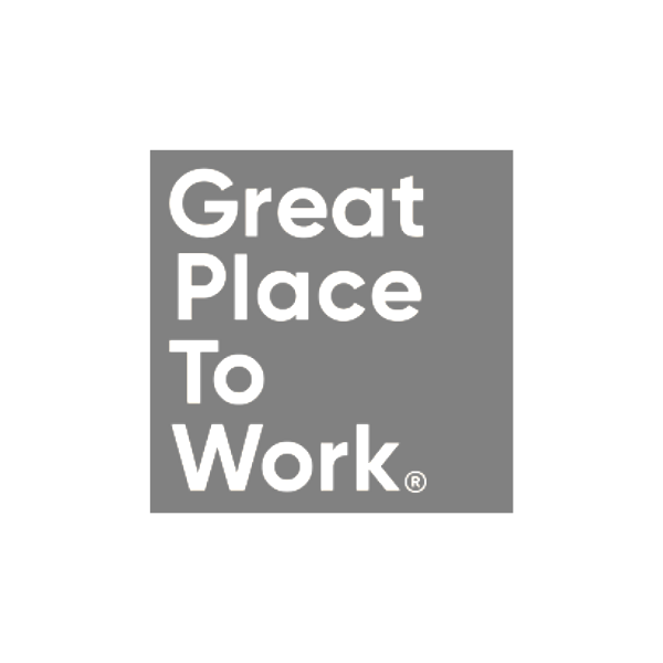 A logo with the text 'Great Place To Work' in white, bold letters on a gray background.