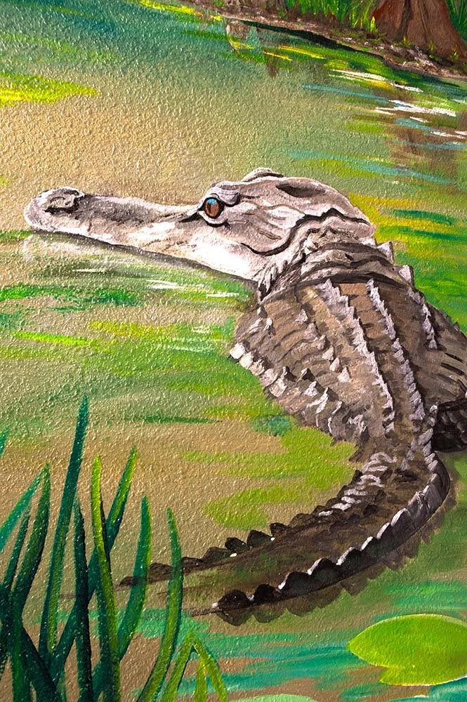 Painting of a crocodile in a green swamp with tall grass.