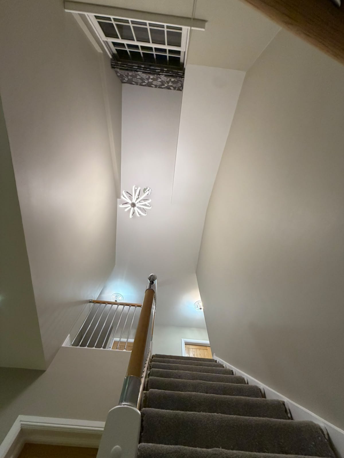 brentwood-hall-stairs-landing-decorating-stairwell-high-ceiling.jpg