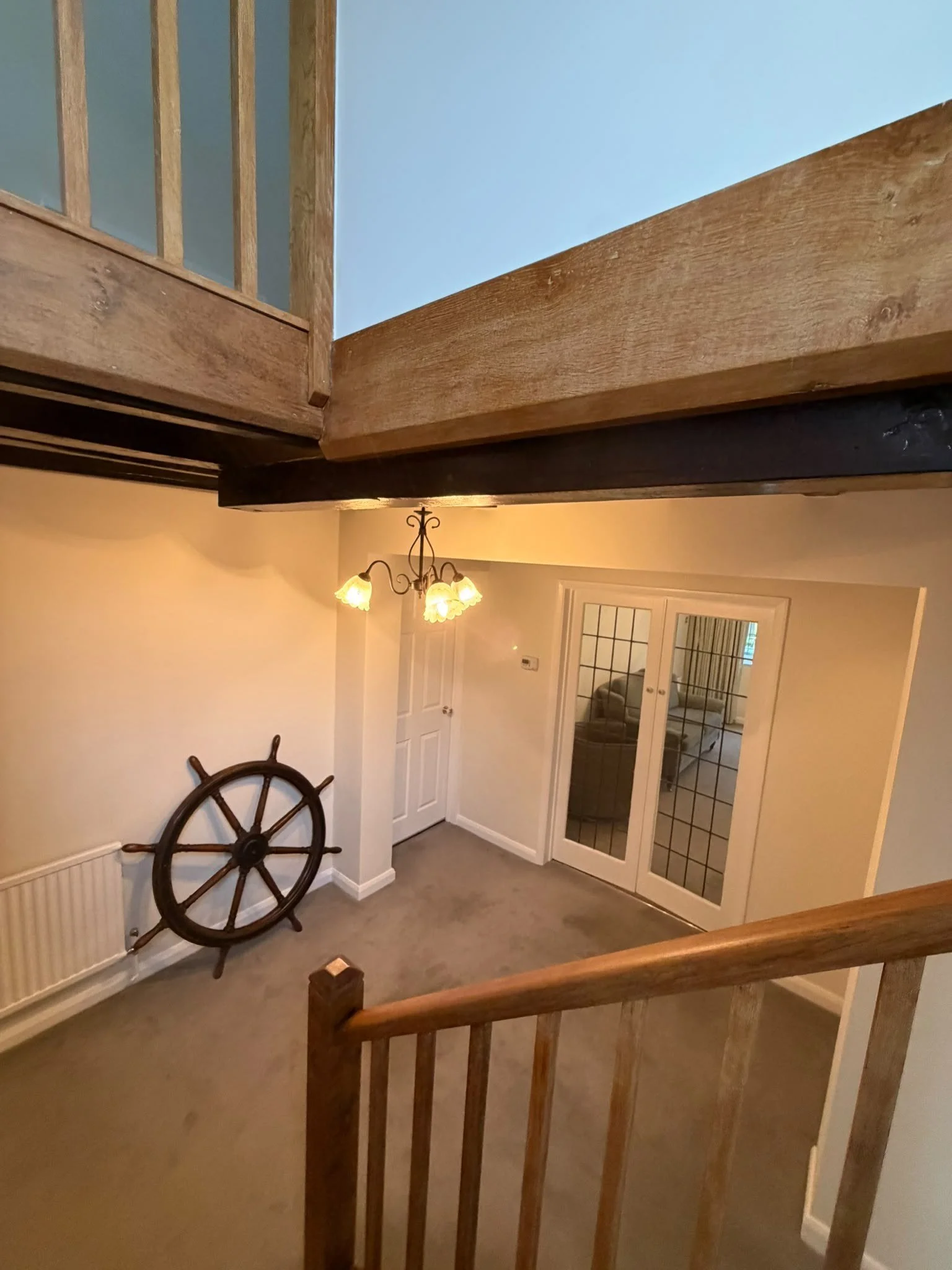 stained-beam-and-oak-handrail-landing.jpg