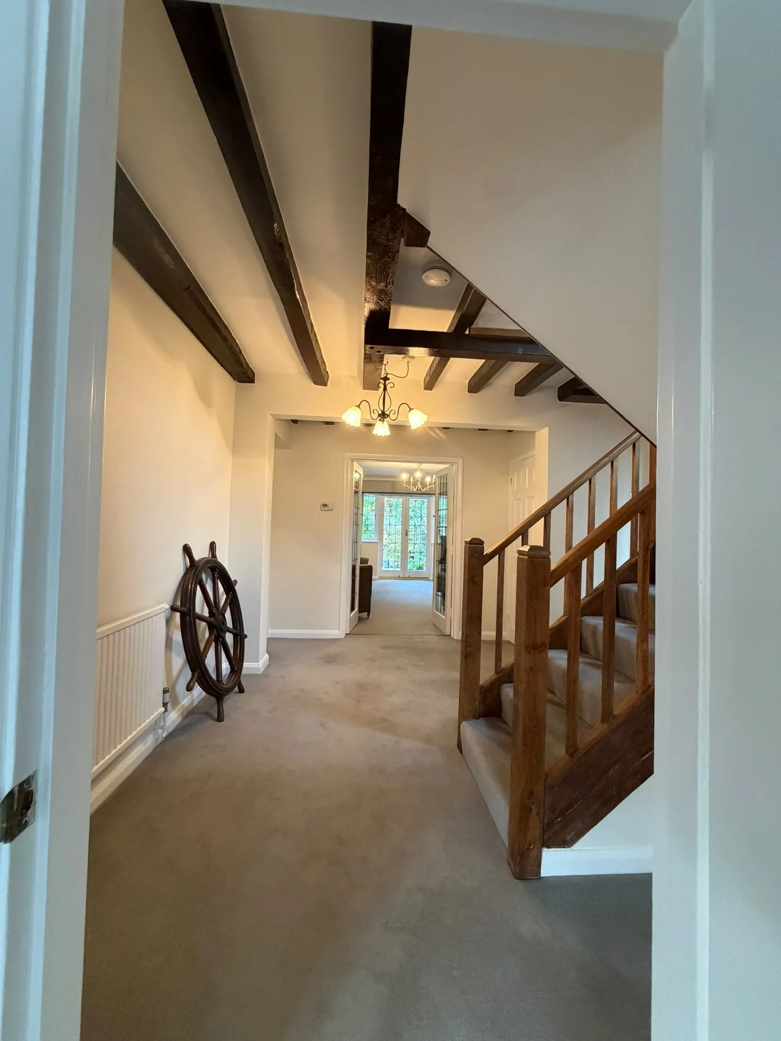 finished-hall-beams-and-staircase.jpg