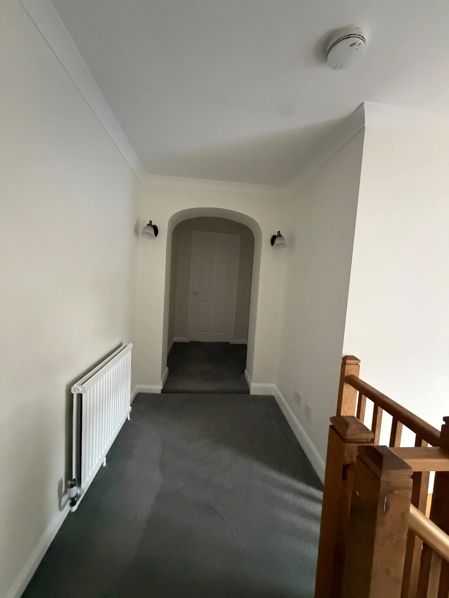 finished-landing-arch-walls-ceiling-skirting.jpg