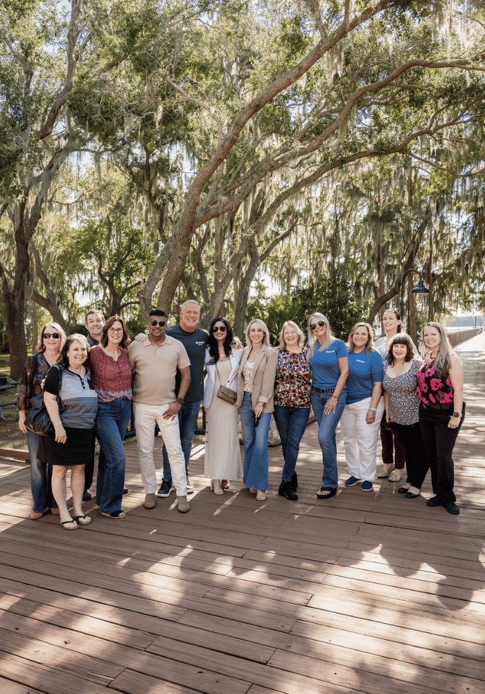 A team of agents, leadership, and staff of real estate professionals in Central Florida with ERA Grizzard Real Estate