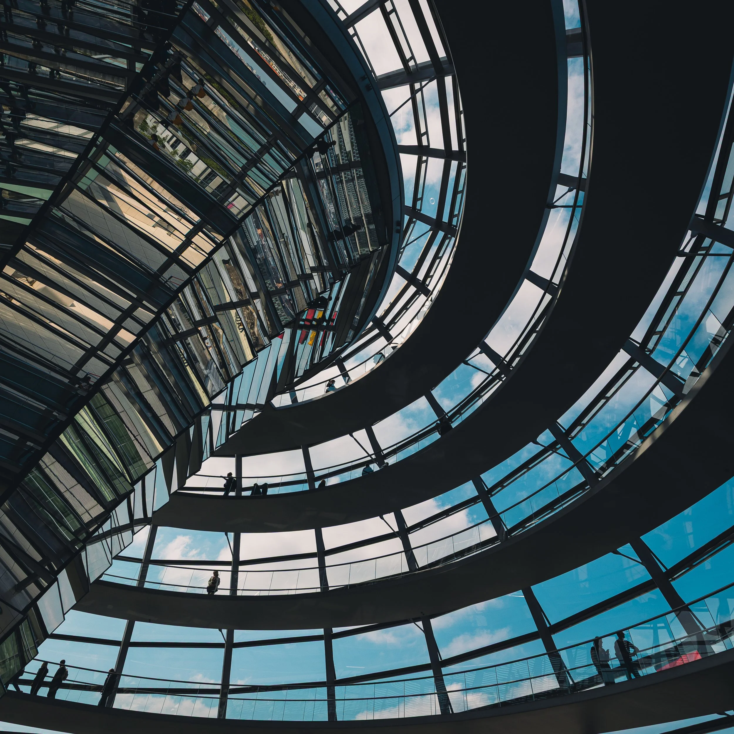 Curving glass and steel staircase structure inside the Reichstag in Berlin