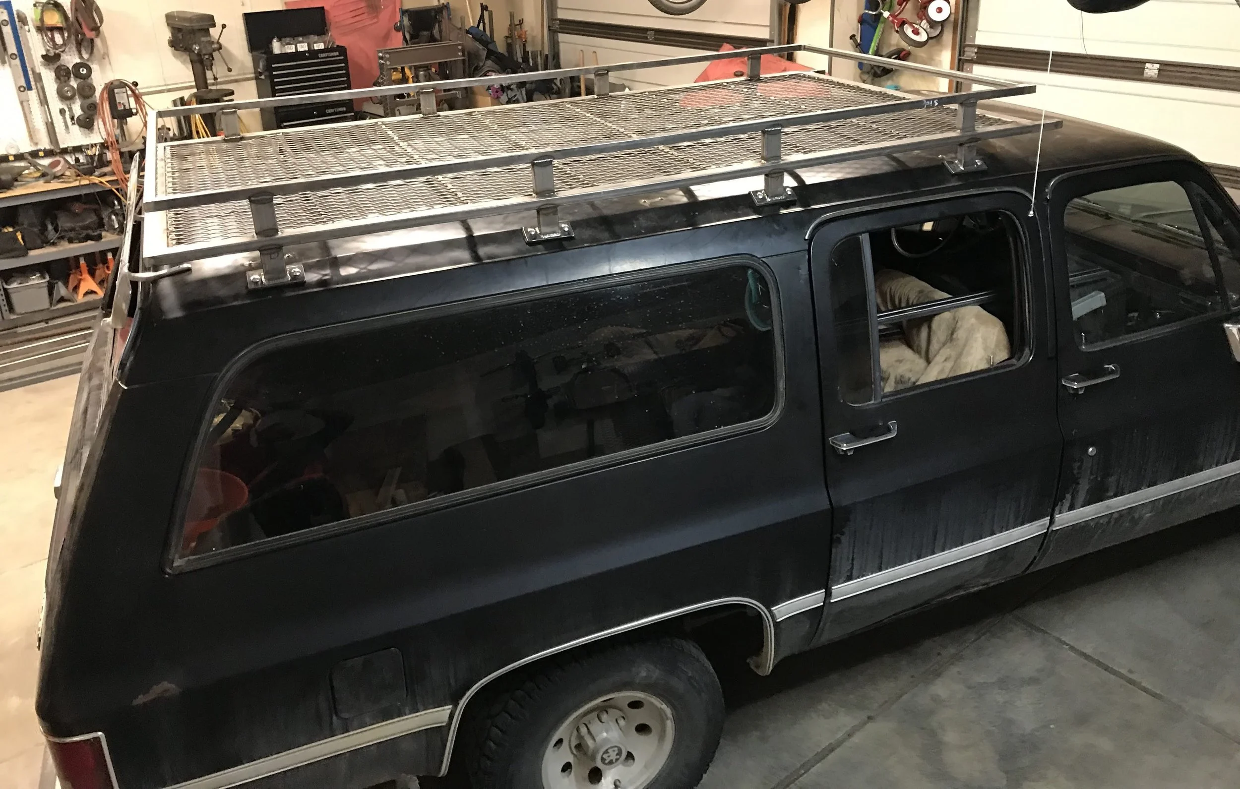 Custom Roof Rack for a truck with a metal base and metal sides 