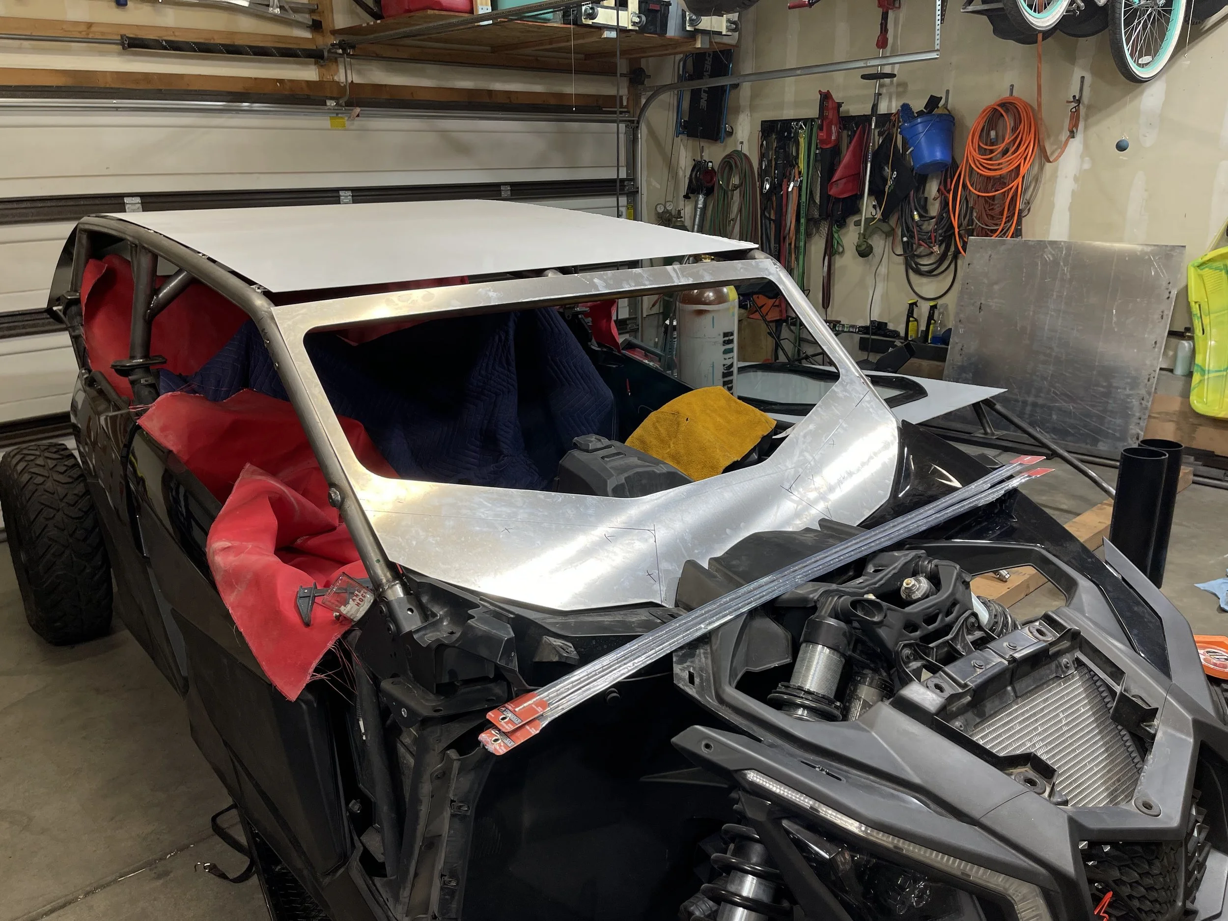Custom Can-am roll cage attached with a steel overlay