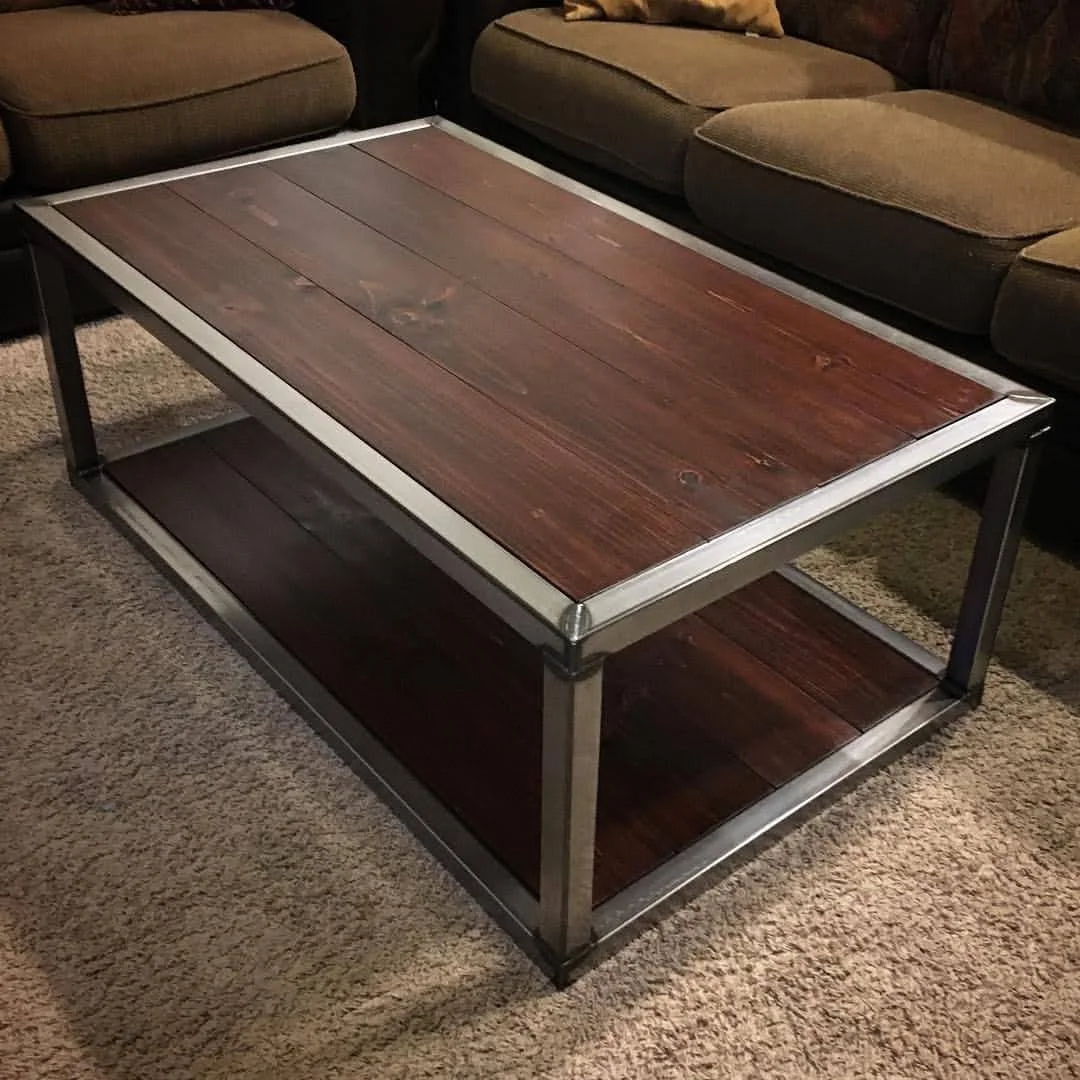 Framed metal coffee table with wood inlay