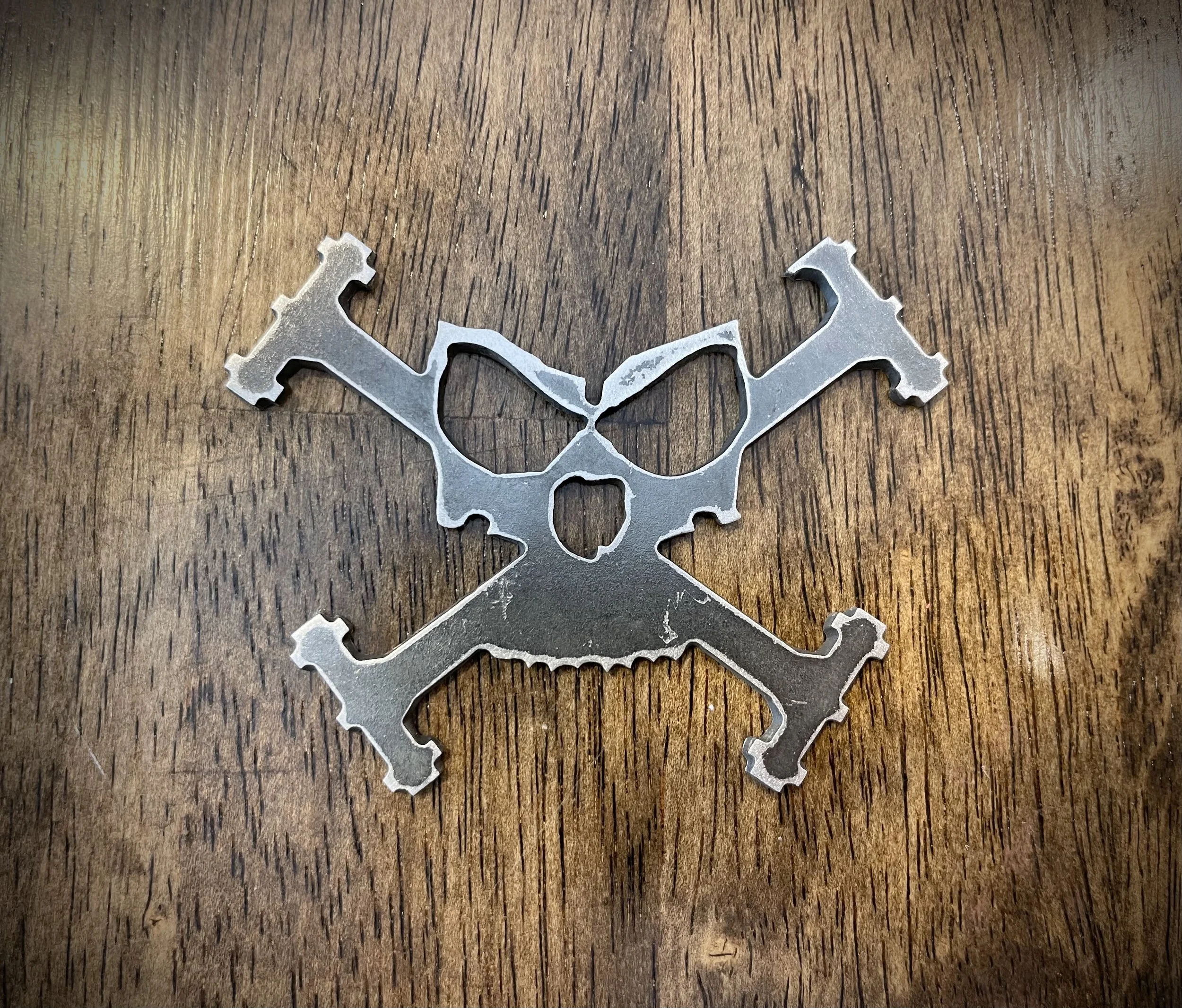 Custom bottle opener with skull and crossbones