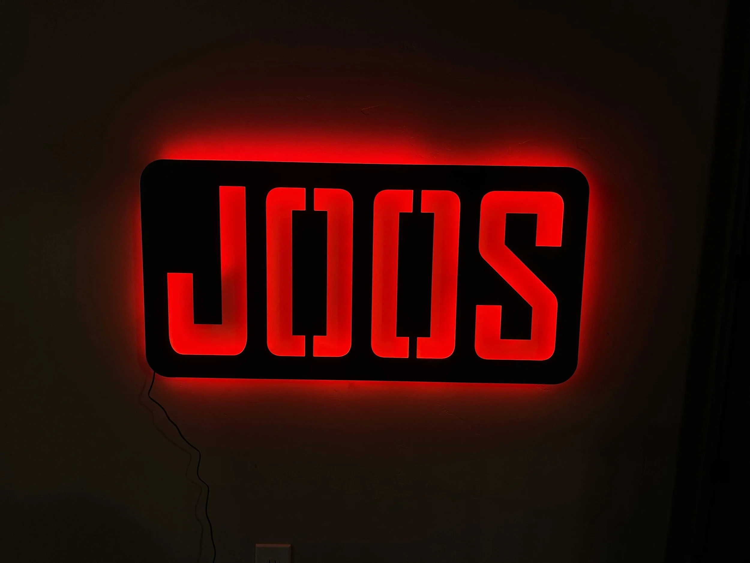 Joos sign with red LED backing 