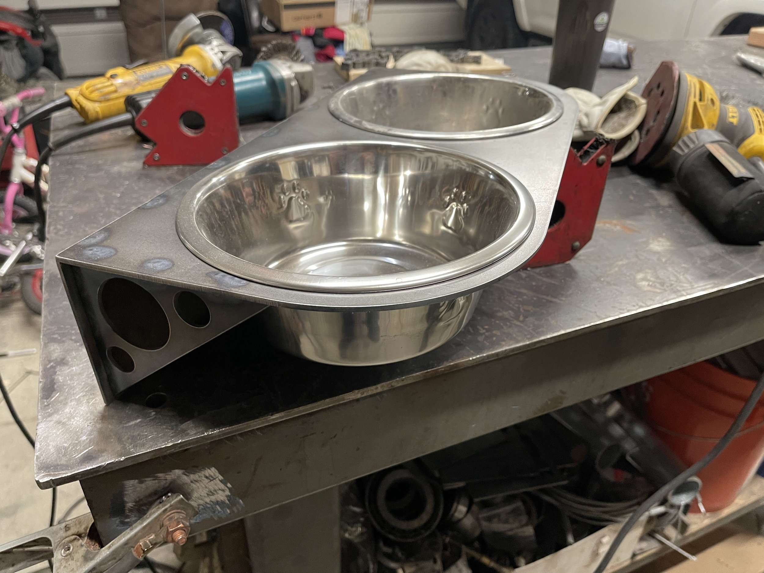 Custom dog bowl holder with space for 2 bowls on a metal shelf