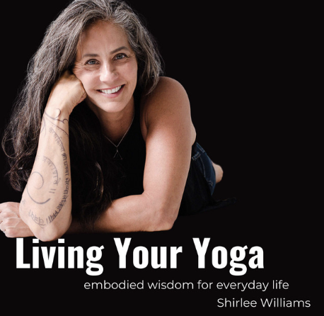 Book cover titled 'Living Your Yoga' by Shirlee Williams featuring a woman with long gray hair smiling, resting her head on her hand, set against a black background.