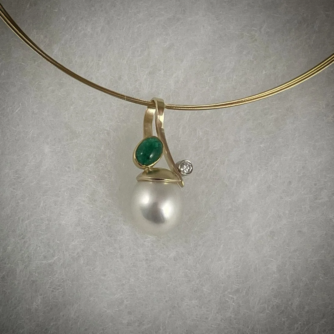 OUCH--IT IS HOT
14k yellow gold pendant with emerald, South Sea pearl and diamond--3500.00