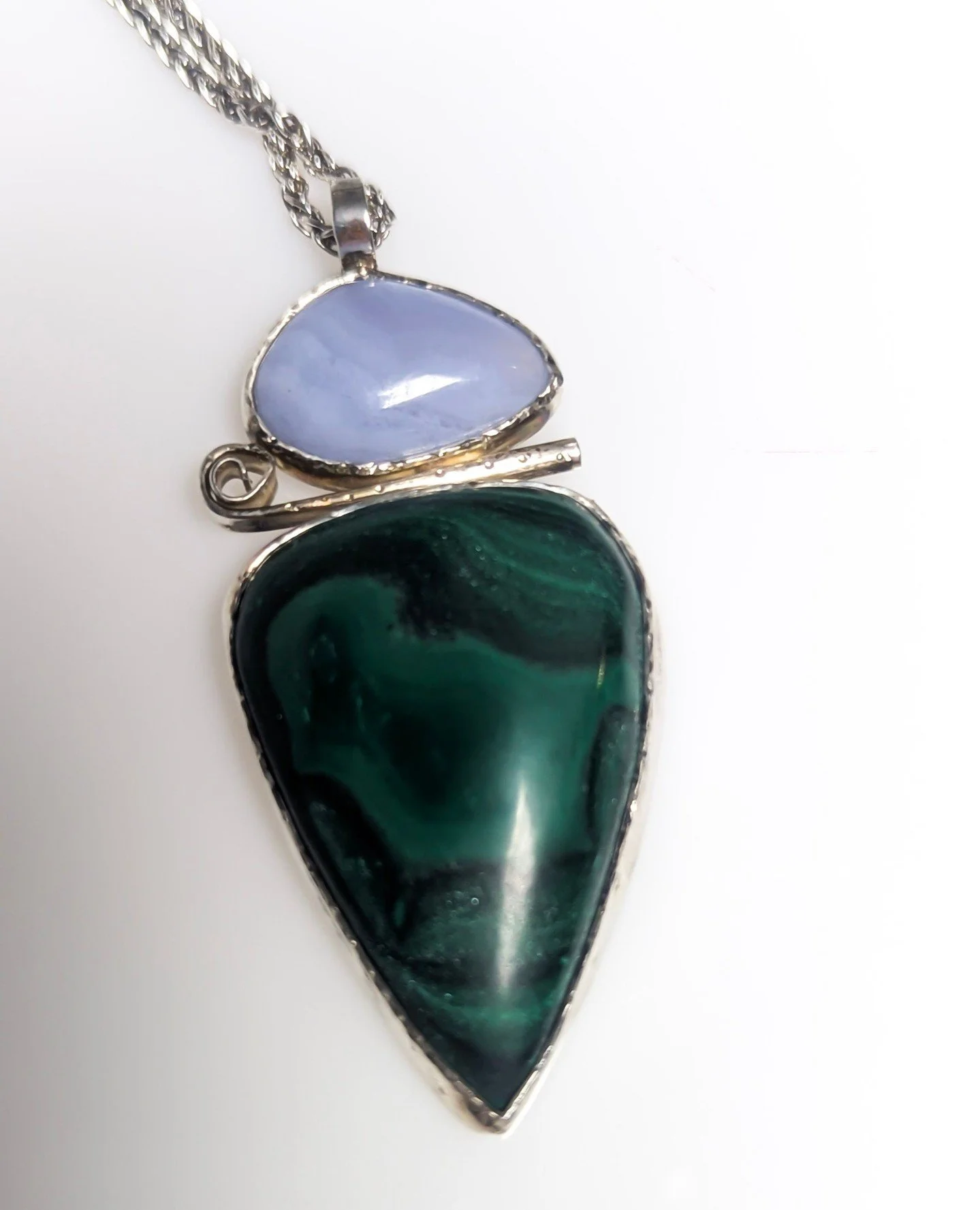 Stop by to add some whimsy and sparkle to your week! ⁠❇️⁠
Pendant by Crazy Hair Susan⁠ - sterling silver, malachite, agate