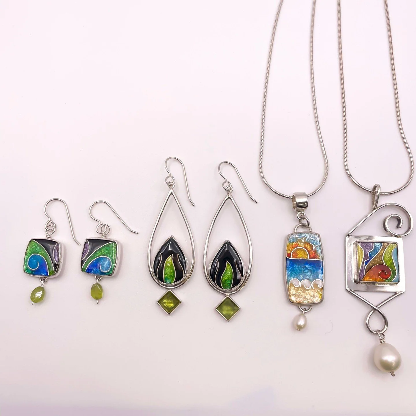 Welcome to one of our new artists, Vitrice McMurray, from New Orleans. Her work features silver and goldplate, accented with precious and semi-precious stones and incorporating cloisonne enamel. Come by to see some of her work we have in the shop!