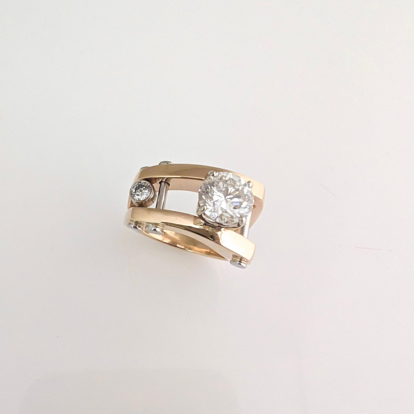 Custom Bill Wismar Flair Ring Design using client stones⁠
⁠
18 karat yellow gold and platinum with 1.99 cttw diamonds