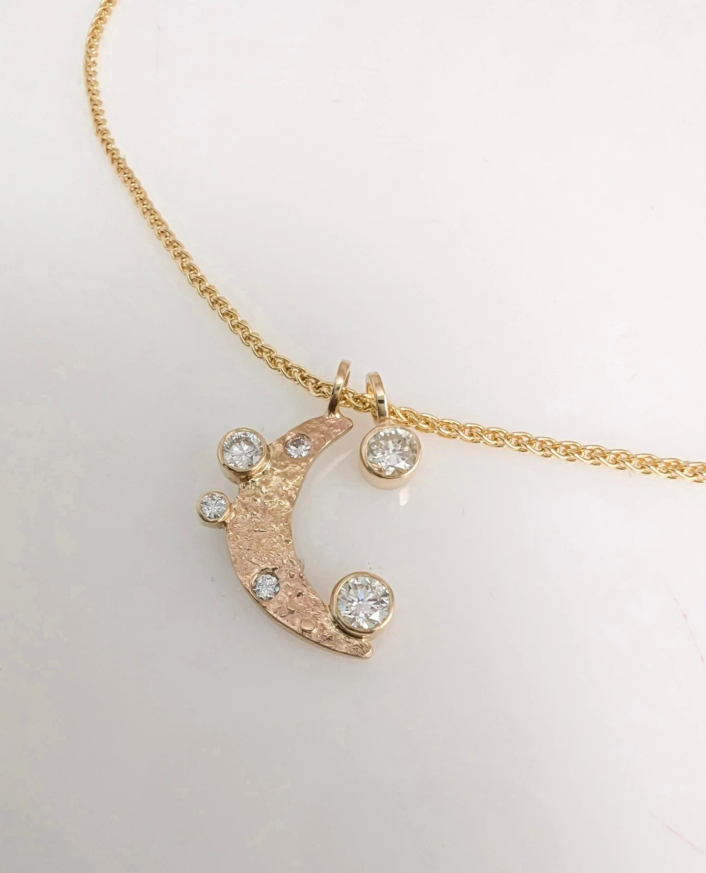 "I love you to the moon and back" 🌙💫✨️⁠
Such a lovely sentiment embodied in this easy-to-wear piece using @debbadaily's old gold and her grandmother's stones to represent her children! Piece done by @rockypardo.