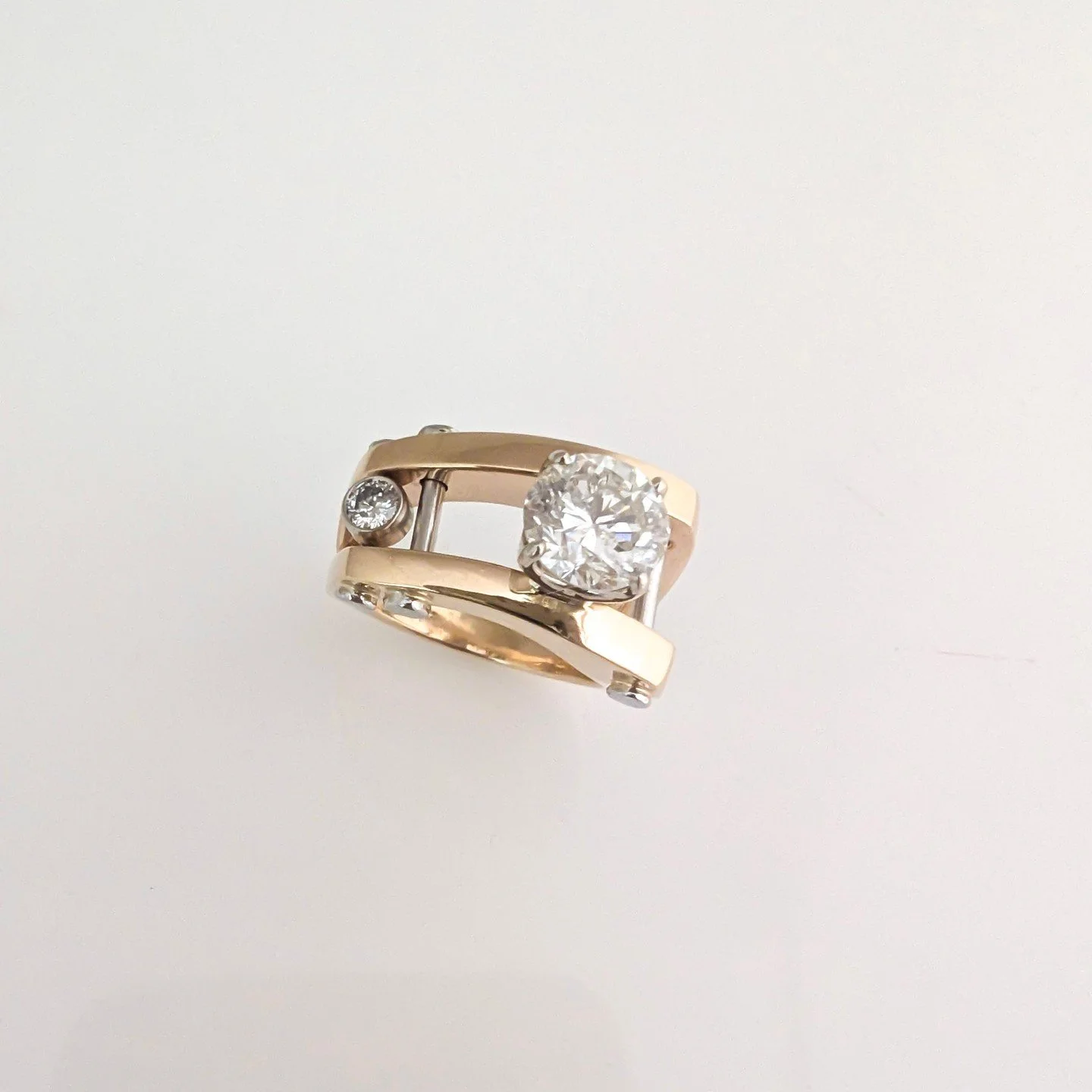 Custom Bill Wismar Flair Ring Design using client stones⁠
⁠
18 karat yellow gold and platinum with 1.99 cttw diamonds
