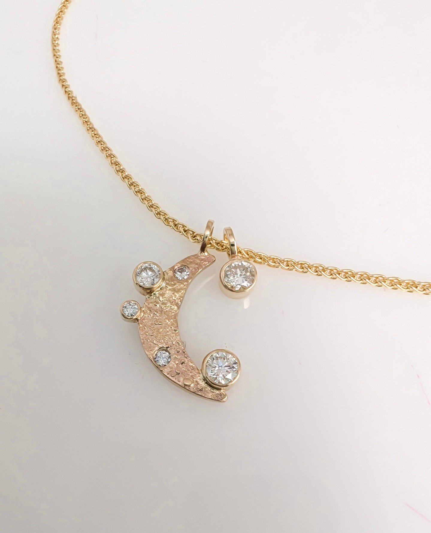 "I love you to the moon and back" 🌙💫✨️⁠
Such a lovely sentiment embodied in this easy-to-wear piece using @debbadaily's old gold and her grandmother's stones to represent her children! Piece done by @rockypardo.