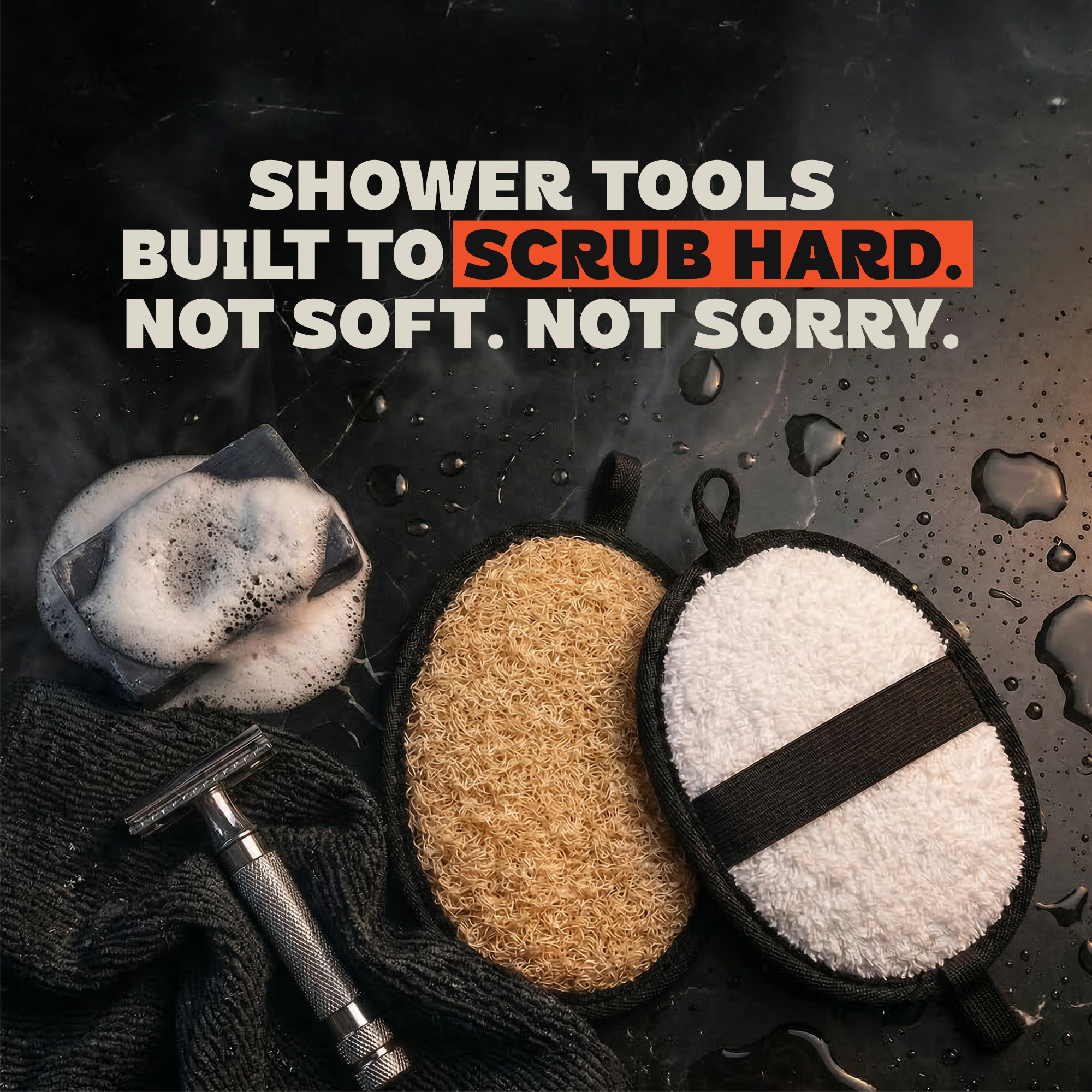 Shower tools including a soap dish with soap, a loofah, a microfiber scrub pad, a safety razor, and a pair of gloves on a wet black surface.