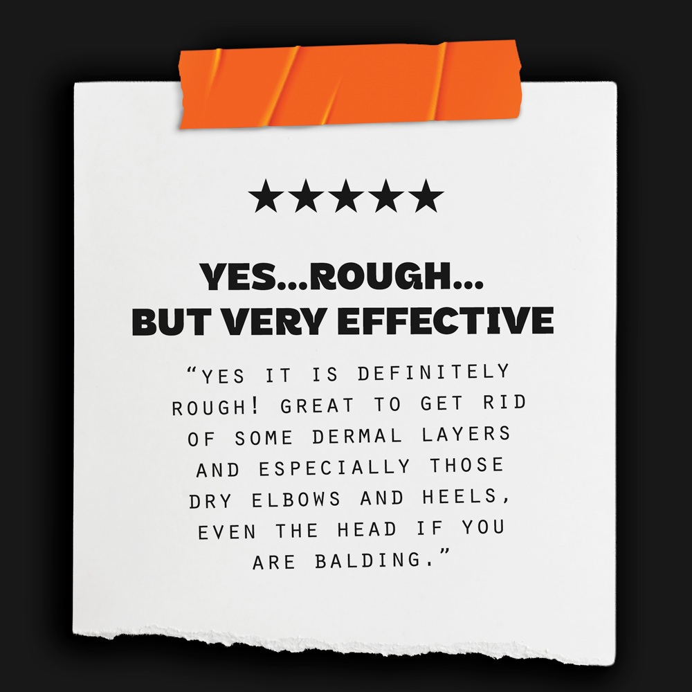 Customer review on a white paper with five-star rating, taped with orange tape on a black background, describing a rough but effective product for skin removal.