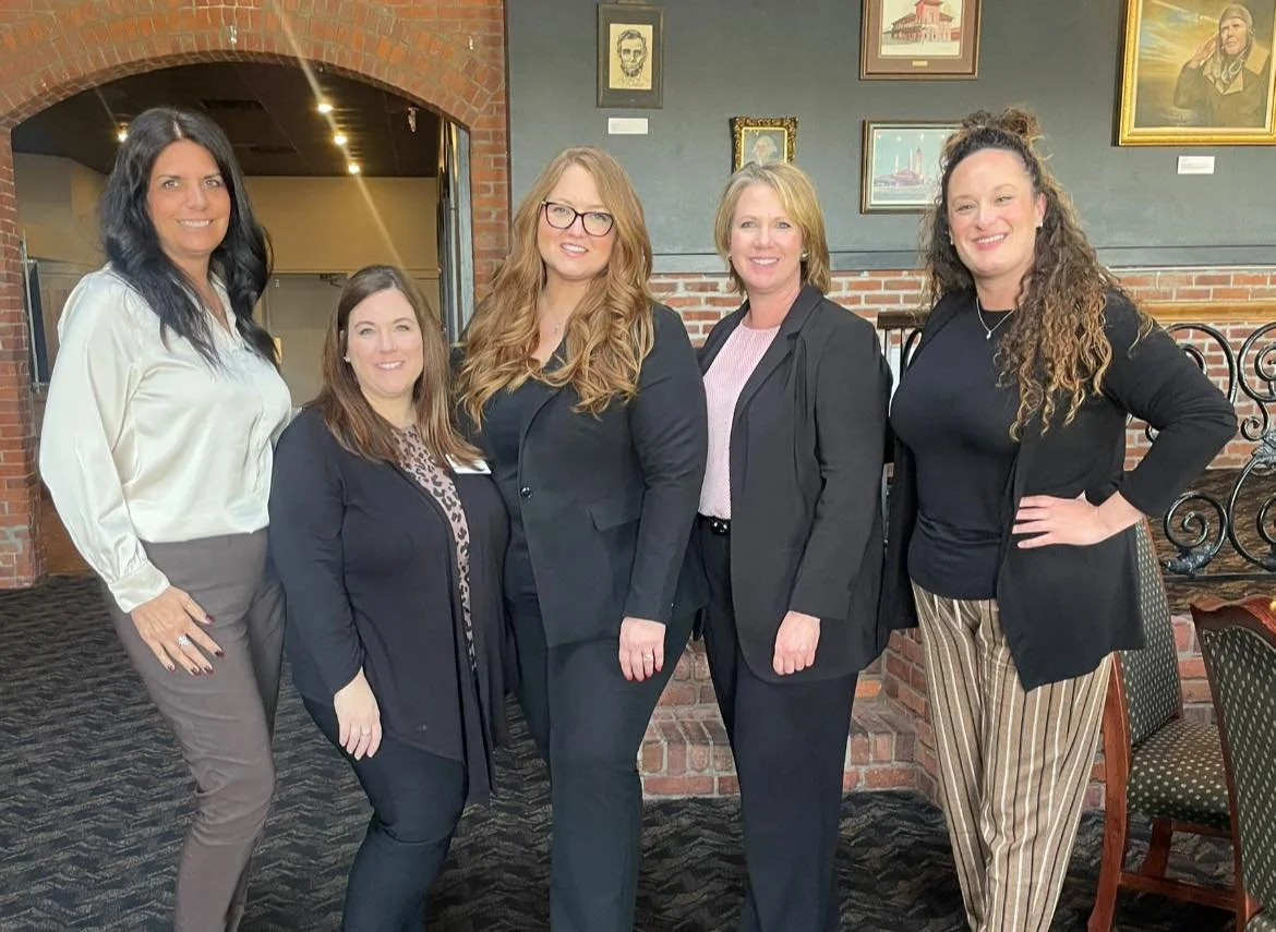 Picture of a few of the women in leadership members at an event.