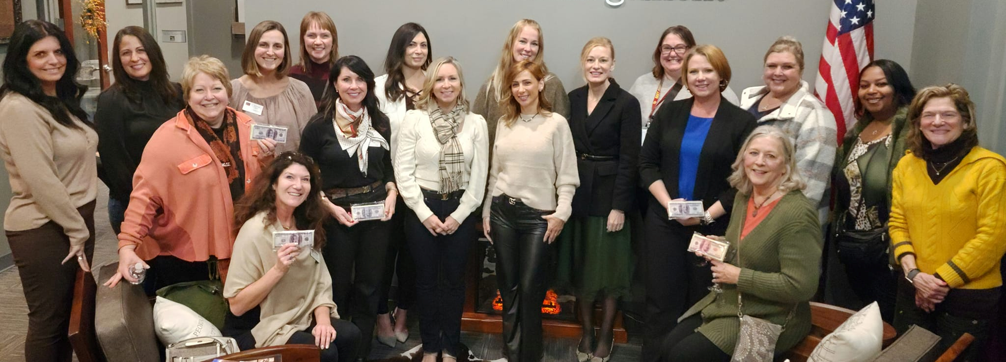 Women in leadership members getting picture taken at WIL event.