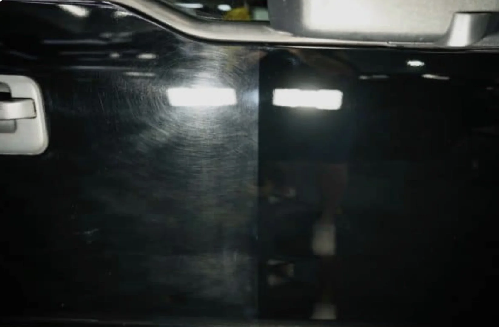 A comparison of a car's exterior body panel before and after polishing, showing a smooth, shiny surface on the right and a dull, scratched surface on the left.