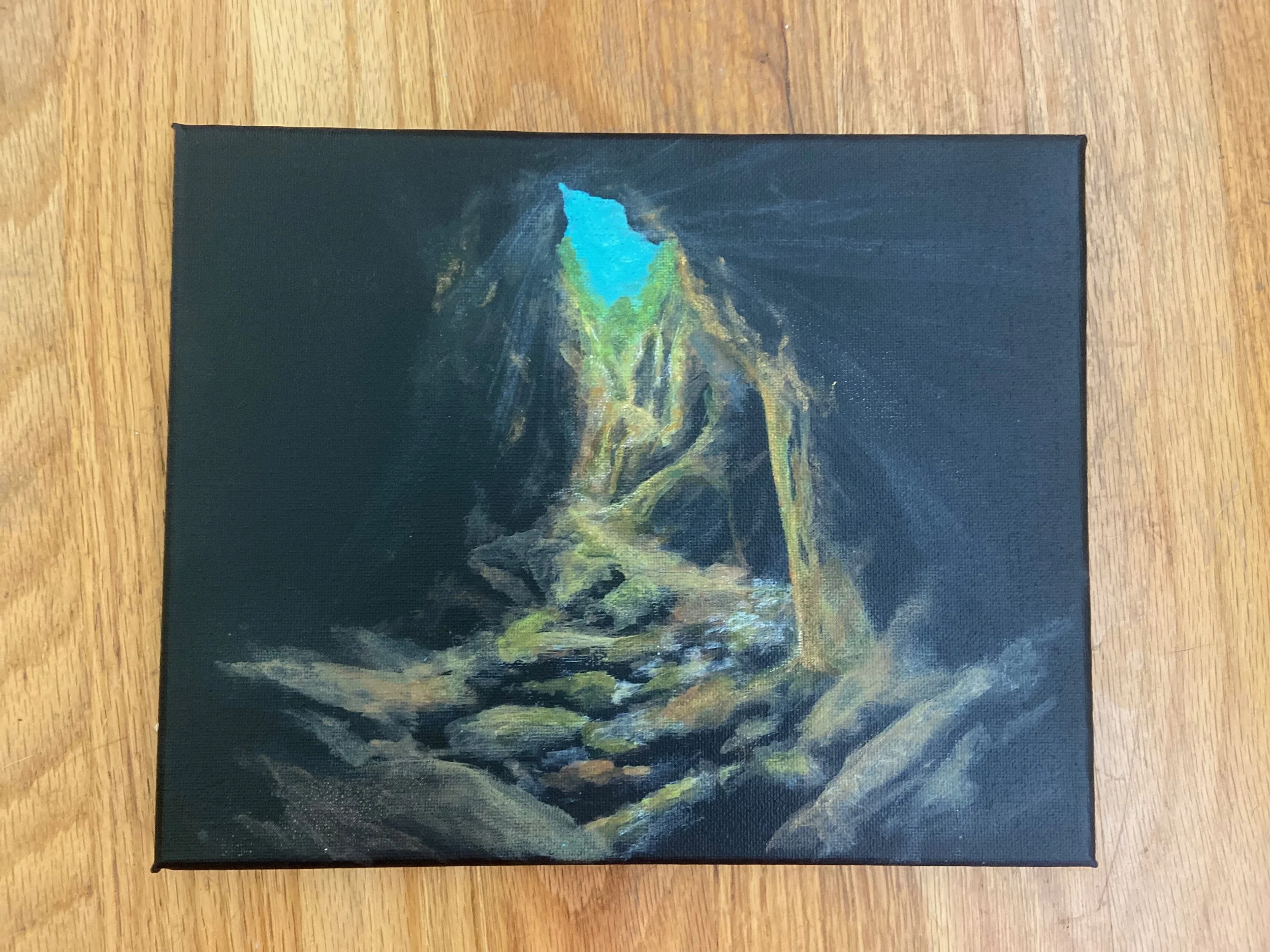 Painting of a person sitting in a dark space with a light source coming from above, highlighting their head and hands.