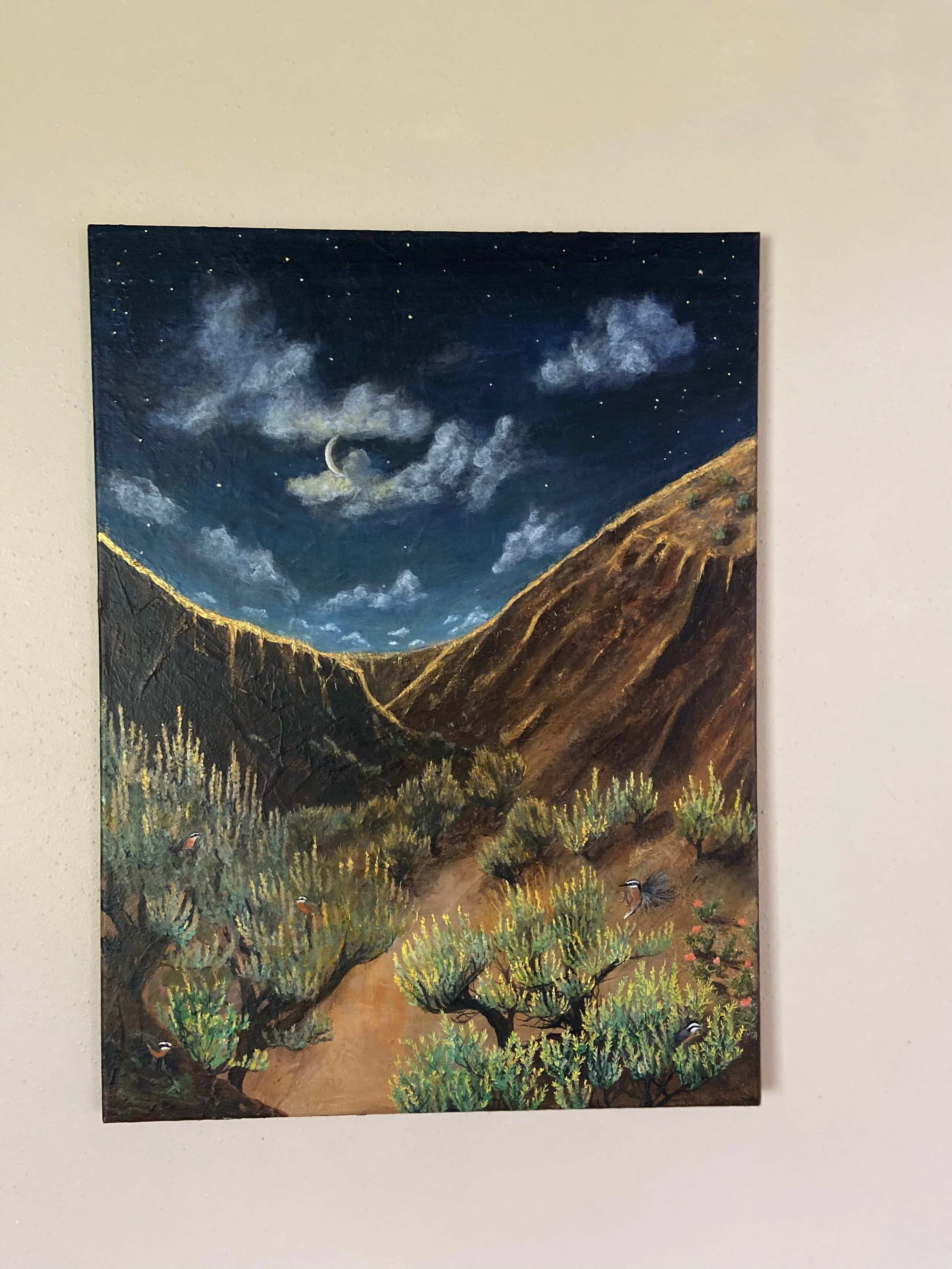 A painting of a nighttime landscape with a mountain valley under a starry sky, crescent moon, and clouds, with desert plants and birds in the foreground.