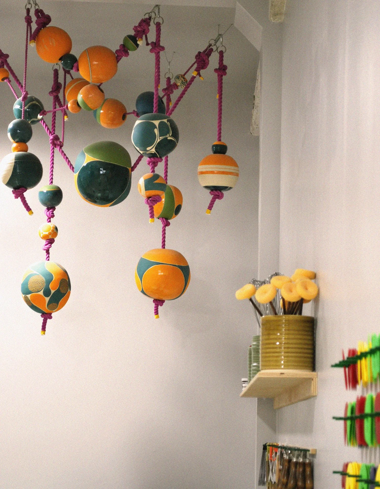 Displayed at Merritt Ceramics
ceramics spheres range from 4" - 21" in diameter. Total installation approx. 4' x 7'